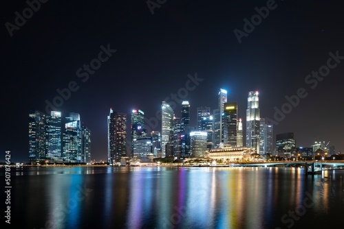 Singapore May 22nd 2022 - Cityscape of the Singapore financial business district at night © sleg21