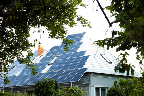 Solar photovoltaic panels on a house roof