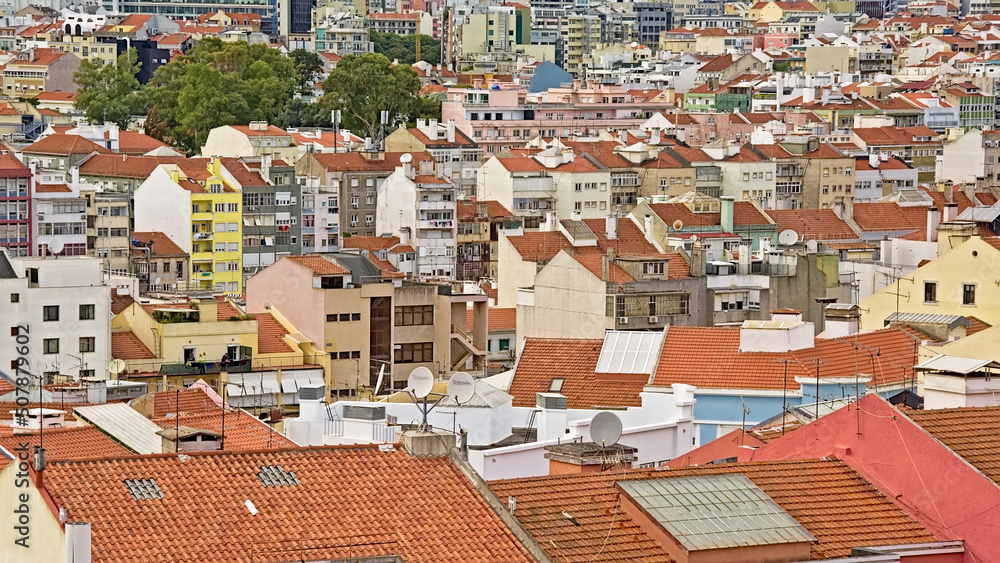 High angle view on traditional houses with orange tiled roofs in Alfama district, Lisbon, Portugal 