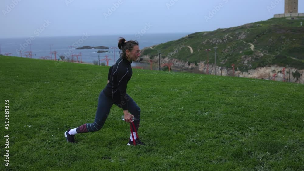 The girl does exercises in the fresh air. The girl does exercises in the fresh air.