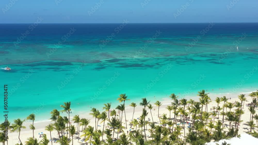 Pristine and bounty shore. Arena Gorda beach with resorts. People faving fun on caribbean coastline. Aerial view from drone Pristine and bounty shore. Arena Gorda beach with resorts. People faving fun on caribbean coastline. Aerial view from drone