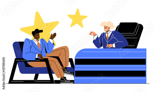 Celebrities at interviews concept. Young male superstar communicates with host of night show. Guest sits in chair in studio and answers questions. Cartoon flat vector illustration in doodle style