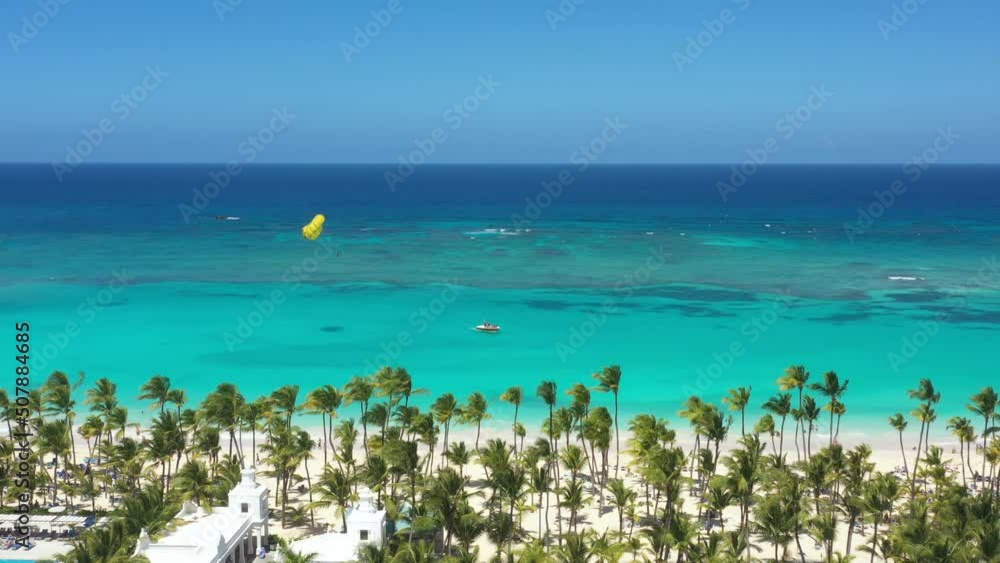 Pristine and bounty shore. Arena Gorda beach with resorts. People faving fun on caribbean coastline. Aerial view from drone Pristine and bounty shore. Arena Gorda beach with resorts. People faving fun on caribbean coastline. Aerial view from drone