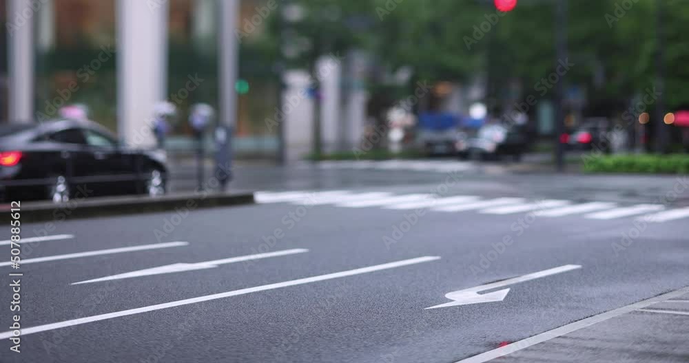 Walking people on the street in Marunouchi Tokyo rainy day Walking people on the street in Marunouchi Tokyo rainy day