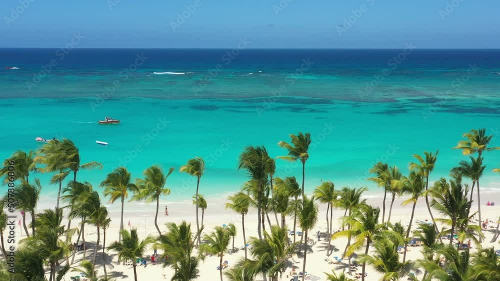 Pristine and bounty shore. Arena Gorda beach with resorts. People faving fun on caribbean coastline. Aerial view from drone Pristine and bounty shore. Arena Gorda beach with resorts. People faving fun on caribbean coastline. Aerial view from drone