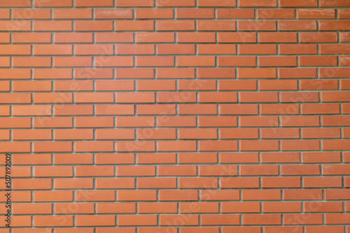 The red brick wall texture background is neatly arranged