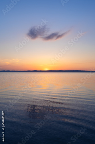 Obraz na płótnie Sunset at beach. Panoramic beach landscape. Golden sunset sky calmness relaxing sunlight summer mood. Vacation travel holiday banner w salonie