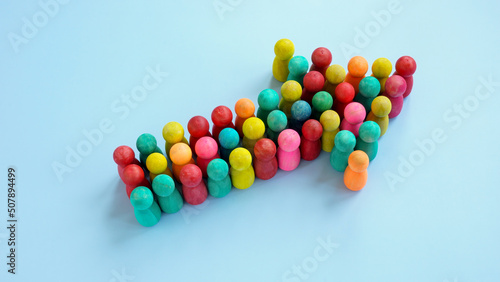 Slika na platnu Unity concept. An Arrow from multi-colored figures.