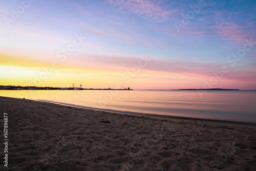 peaceful sand beach island with a dusk sky and peaceful environment