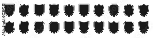 Set of various vintage shield icons. Black outlined heraldic shields. Protection and security symbol, label. Vector illustration.