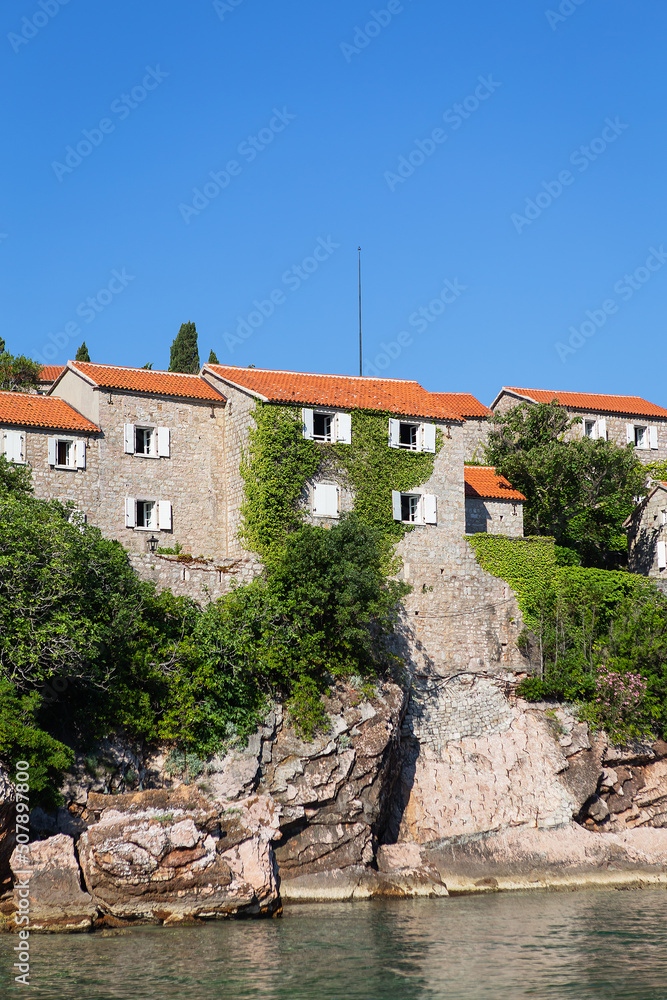 Famous architectural monument of the island resort of St. Stephen St. Stephen in the Adriatic Sea, Montenegro. The concept of recreation at sea. Famous architectural monument of the island resort of St. Stephen St. Stephen in the Adriatic Sea, Montenegro. The concept of recreation at sea.