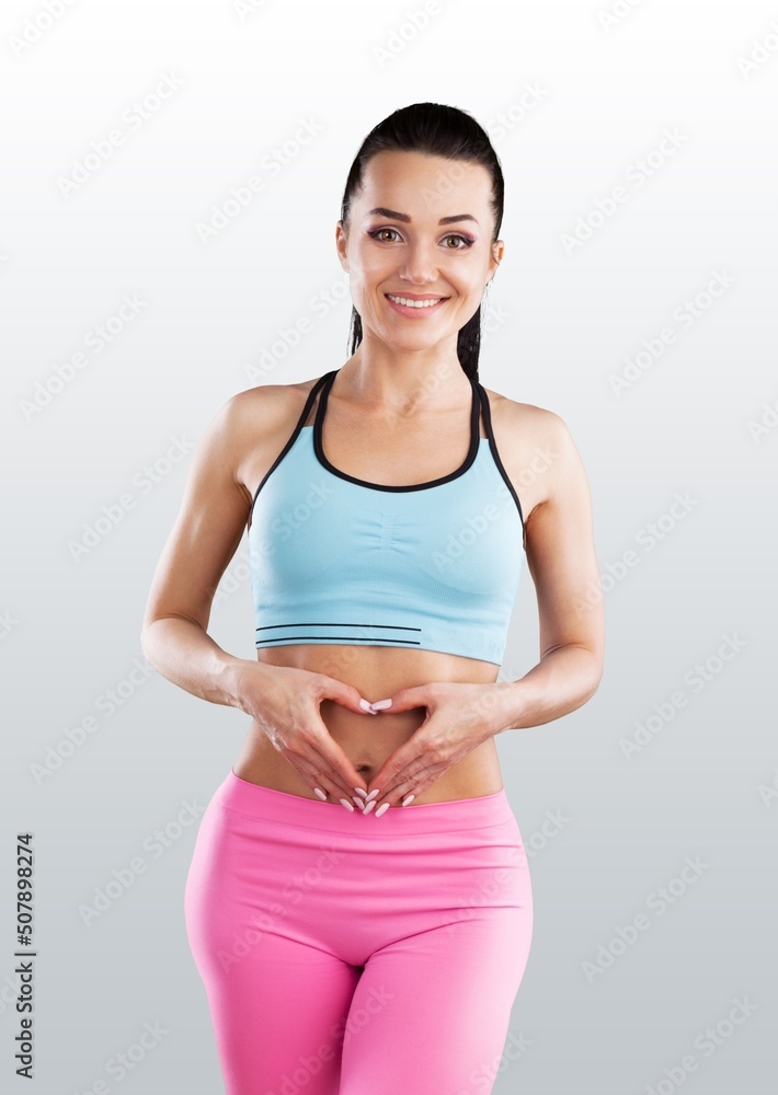 Sexy fitness woman. Beautiful athletic girl posing Sexy fitness woman. Beautiful athletic girl posing