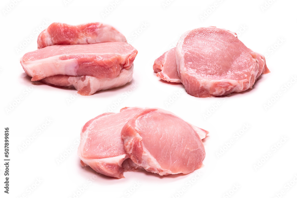 Raw pork pieces isolated on a white background. Raw pork pieces isolated on a white background.