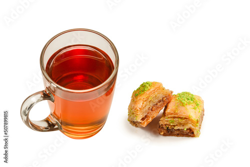 Turkish sweet baklava with turkish tea isolated on a white background. .