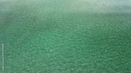 Aerial view of tidal swell with crystal clear clarity