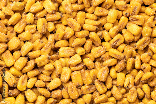 Roasted salted corn snack. Pattern of yellow corn seed.