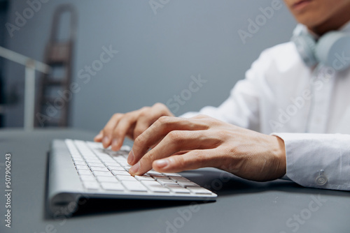 businessmen in a white shirt keyboard work official office isolated background