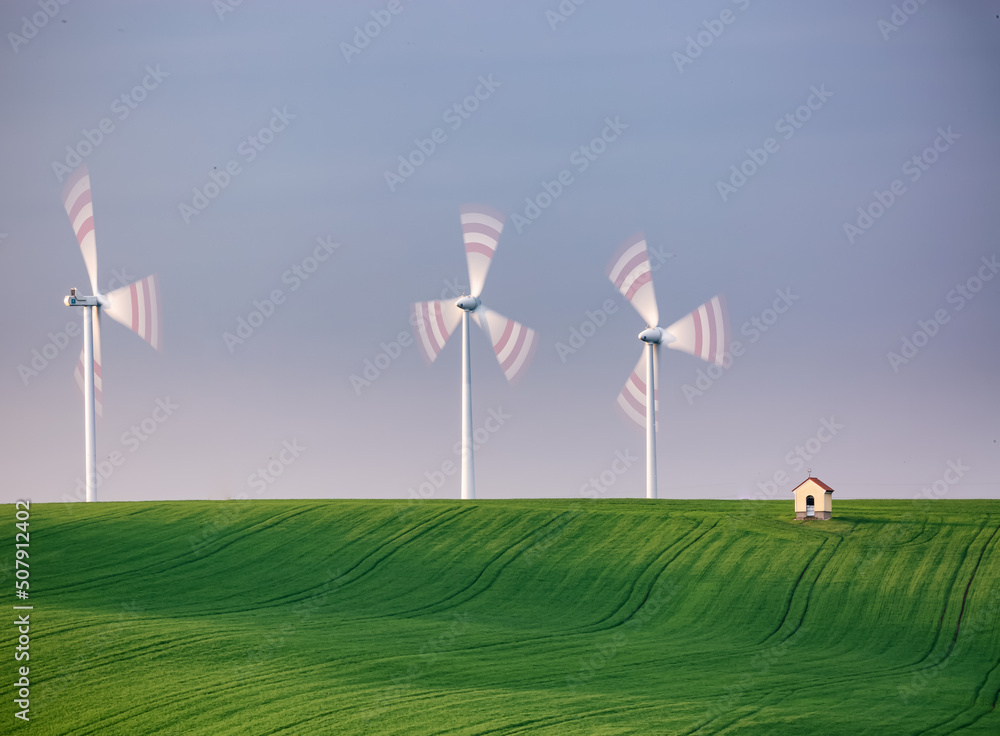 Fototapeta premium wind turbine in the field