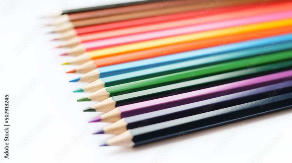 A set of colored pencils isolated on a white background in banner format. Place for text A set of colored pencils isolated on a white background in banner format. Place for text