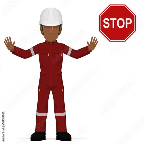 An industrial worker is raise hand to stop