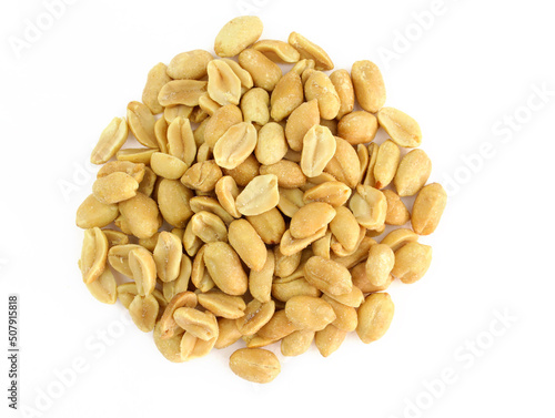 Peeled salted peanuts on a white background. Heap of roasted peanuts without husks close-up. Salted nuts, snacks for beer top view.