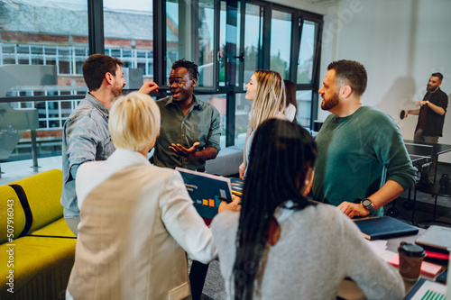 Multiracial business team working together and having a meeting in the office