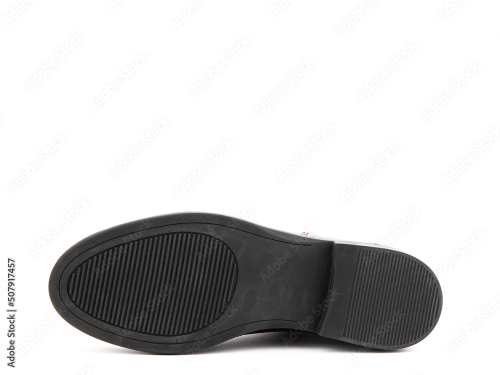 Sole for shoes, bottom view. Shoe sole close-up isolated on white background. place for text. Element of boots. Concept of production of shoe. Sole for shoes, bottom view. Shoe sole close-up isolated on white background. place for text. Element of boots. Concept of production of shoe.