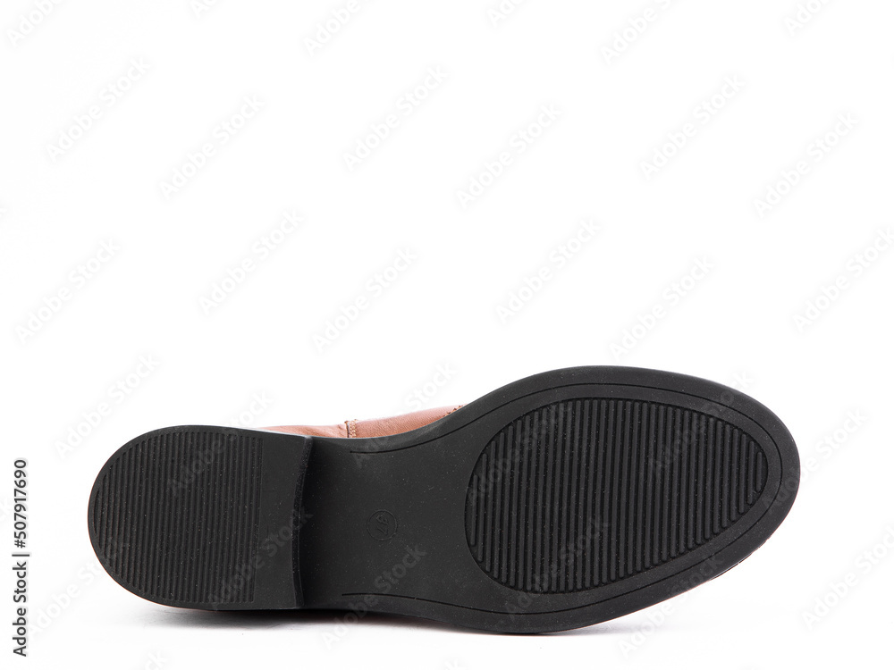 Sole for shoes, bottom view. Shoe sole close-up isolated on white background. place for text. Element of boots. Concept of production of shoe. Sole for shoes, bottom view. Shoe sole close-up isolated on white background. place for text. Element of boots. Concept of production of shoe.