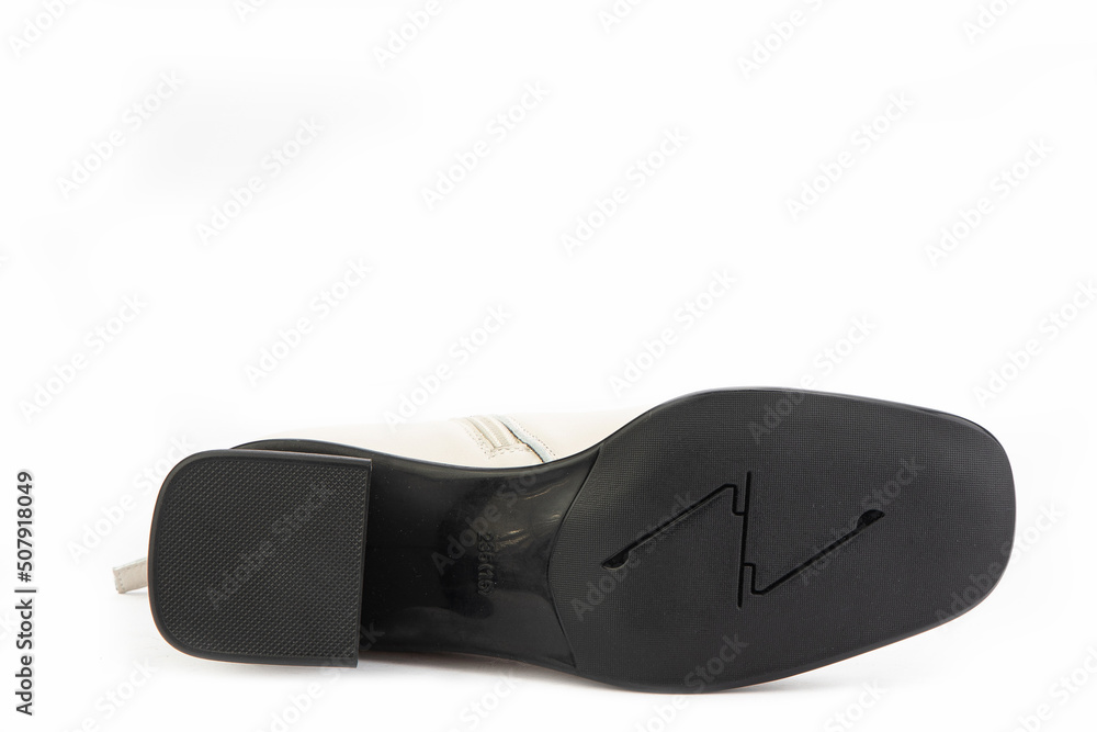 Sole for shoes, bottom view. Shoe sole close-up isolated on white background. place for text. Element of boots. Concept of production of shoe. Sole for shoes, bottom view. Shoe sole close-up isolated on white background. place for text. Element of boots. Concept of production of shoe.