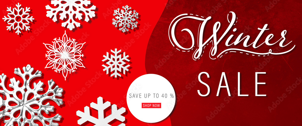 Text WINTER SALE with snowflakes on red background
