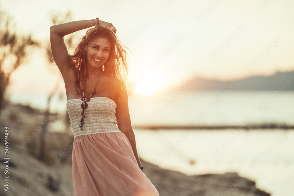 Woman Enjoying A Summer Vacation At The Beach