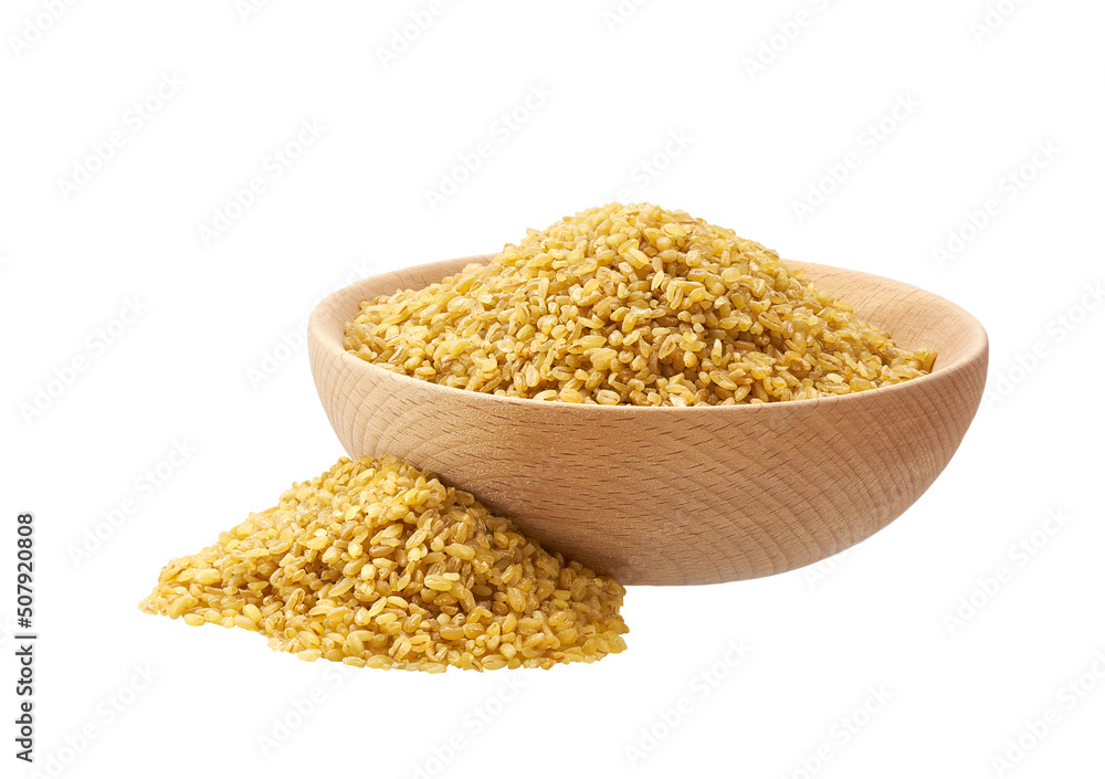 Organic bulgur in a wooden bowl isolated on white background. Organic bulgur in a wooden bowl isolated on white background.