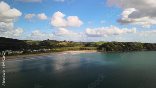 Aerial fly over Coopers Beach, Bay of Plenty New Zealand