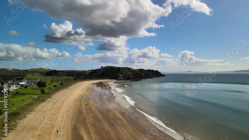 Aerial fly over Coopers Beach, Bay of Plenty New Zealand