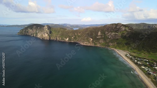 Flying over clifftops in New Zealand's Bay of Islands