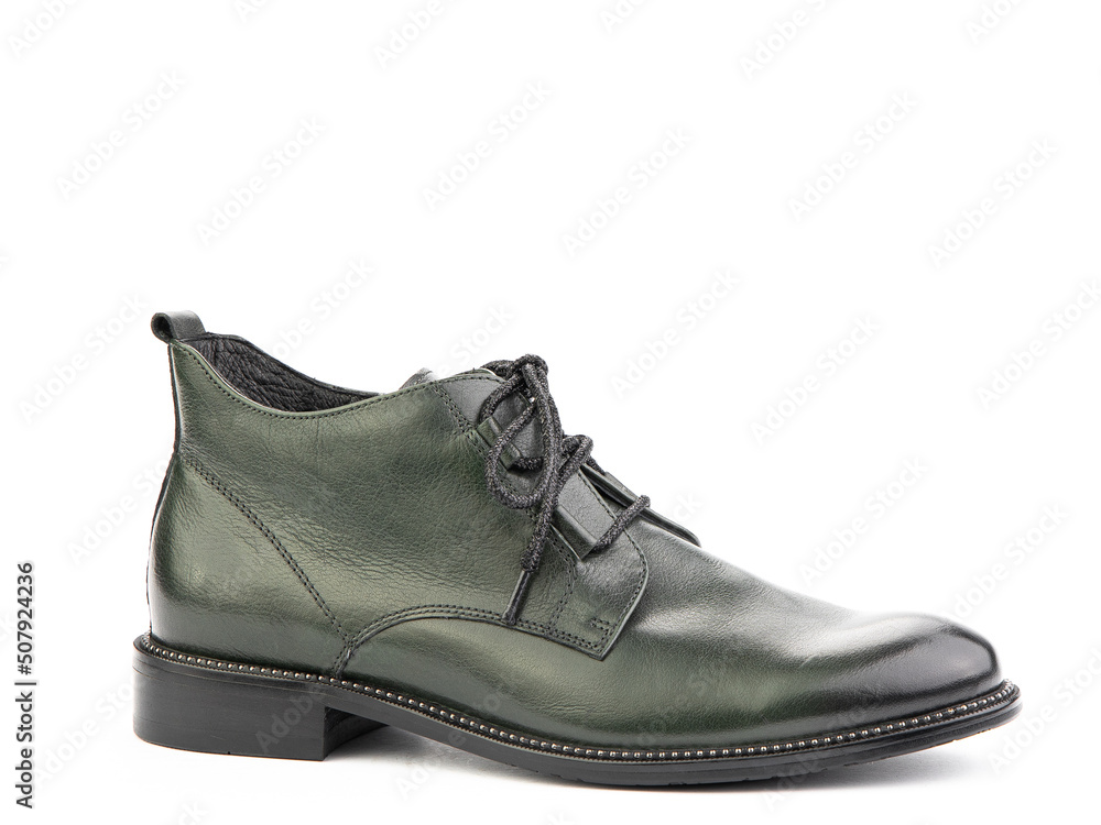 Men's autumn green leather jodhpur boots with laces and average heels, isolated white background. Right side view. Fashion shoes. Men's autumn green leather jodhpur boots with laces and average heels, isolated white background. Right side view. Fashion shoes.