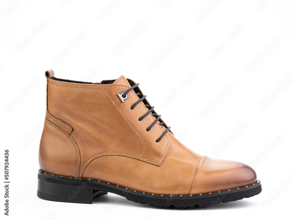 Men's autumn brown leather jodhpur boots with laces and average heels, isolated white background. Right side view. Fashion shoes.