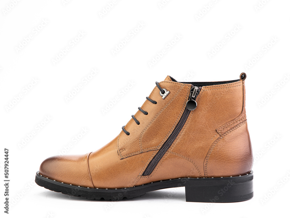 Men's autumn brown leather jodhpur boots with laces and average heels, isolated white background. Left side view. Fashion shoes.