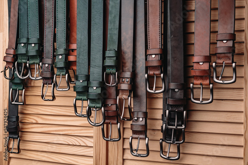  Lots of handmade belts on the counter