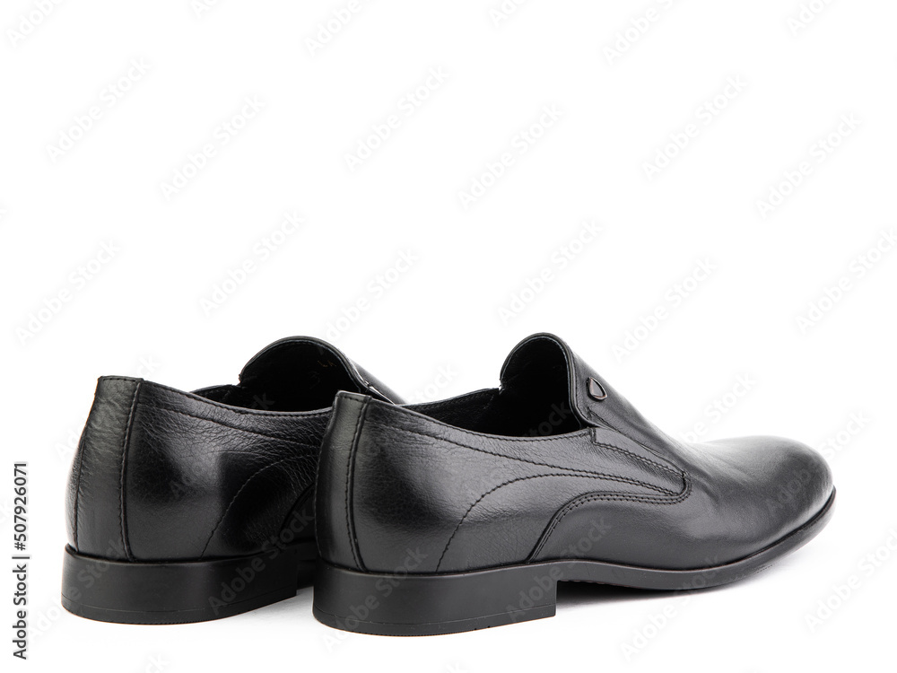 Vintage black men's Loafer Shoes. Closeup. Advertising shot. Leather shoes. Concept closeup shoes. Isolated object close up on white background.
