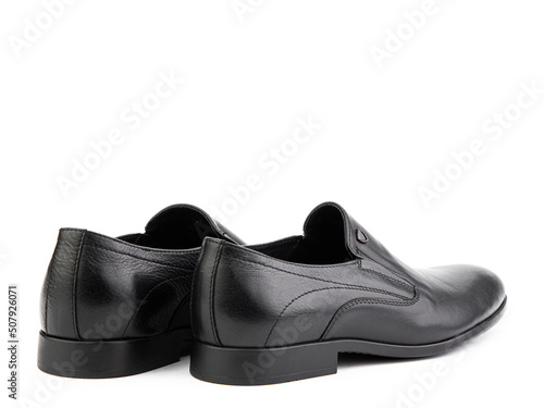 Obraz na płótnie Vintage black men's Loafer Shoes. Closeup. Advertising shot. Leather shoes. Concept closeup shoes. Isolated object close up on white background. w salonie