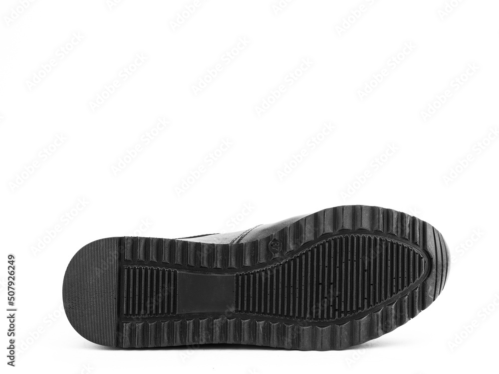 Sole for shoes, bottom view. Shoe sole close-up isolated on white background. place for text. Element of boots. Concept of production of shoe. Sole for shoes, bottom view. Shoe sole close-up isolated on white background. place for text. Element of boots. Concept of production of shoe.