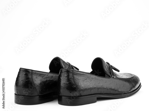 Vintage Men's Loafer Shoes. Closeup. Advertising shot. Leather shoes. Concept closeup shoes. Isolated object close up on white background.