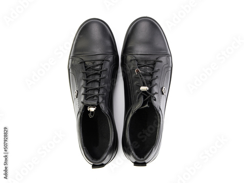 Obraz na płótnie classic sneakers with laces. Casual style. Isolated close-up on white background. Top view. Fashion shoes w salonie