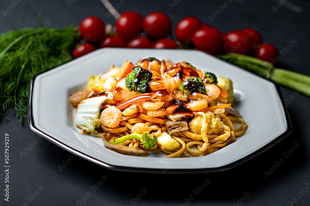 Fresh asian yakisoba shrimp in white dish. Fresh asian yakisoba shrimp in white dish.