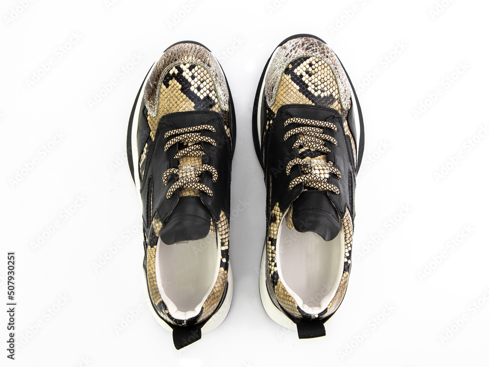 classic sneakers with laces. Casual style. Isolated close-up on white background. Top view. Fashion shoes