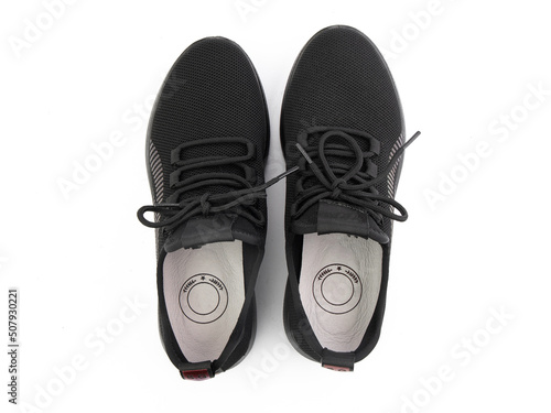 Obraz na płótnie classic sneakers with laces. Casual style. Isolated close-up on white background. Top view. Fashion shoes w salonie