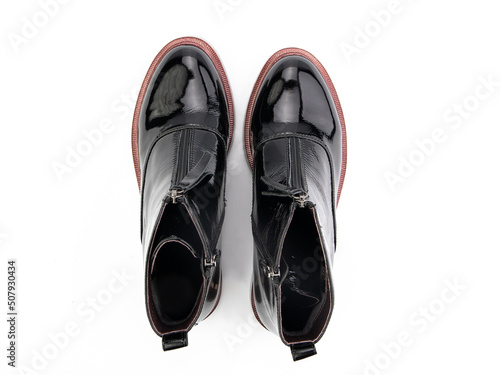 Obraz na płótnie black leather jodhpur boots isolated on white background. Top view. Fashion shoes. Photoshoot for shoe shop concept. w salonie