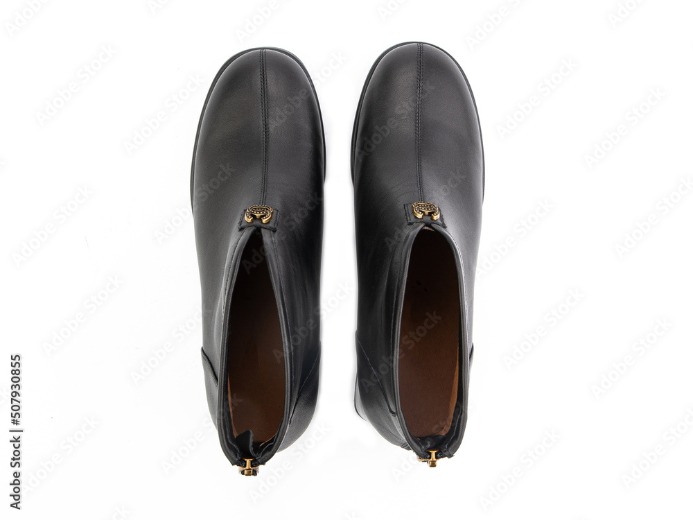 black leather jodhpur boots isolated on white background. Top view. Fashion shoes. Photoshoot for shoe shop concept.