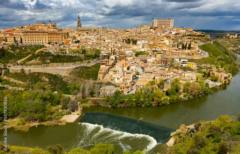 Photo of Toledo with view of Alcazar and Cathedral of Saint Mary, Castilla-La Mancha, Spain.